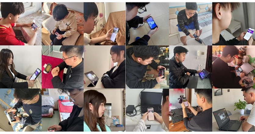 長春建筑學院學生收看直播。